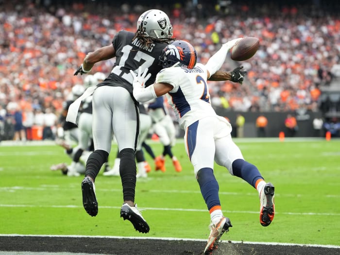 Denver Broncos cornerback Pat Surtain II (2) breaks up a pass intended for Las Vegas Raiders wide receiver Davante Adams (17) during a game at Allegiant Stadium.